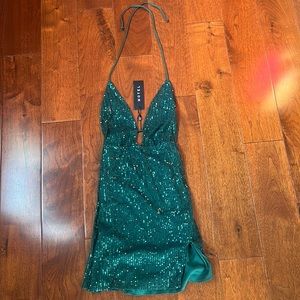 Sequenced, green mini dress from motel rocks